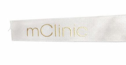 Wstążka biala z nadrukiem zlotym wypukłym